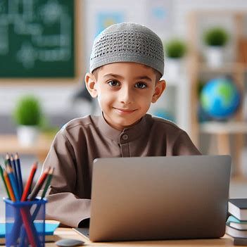 Why Step-by-Step Online Quran Learning Works A square lifestyle photograph of a smiling young Muslim boy wearing a grey knit kufi cap and a brown thobe, sitting at a wooden desk with a laptop, pencils, and books in a brightly lit classroom or study room, illustrating why step-by-step online quran learning works.